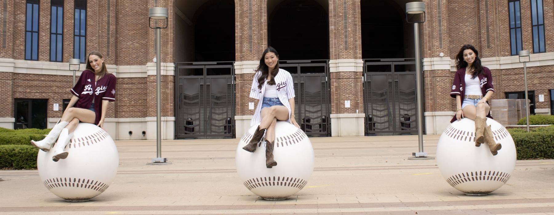 a group of people dancing in front of a building